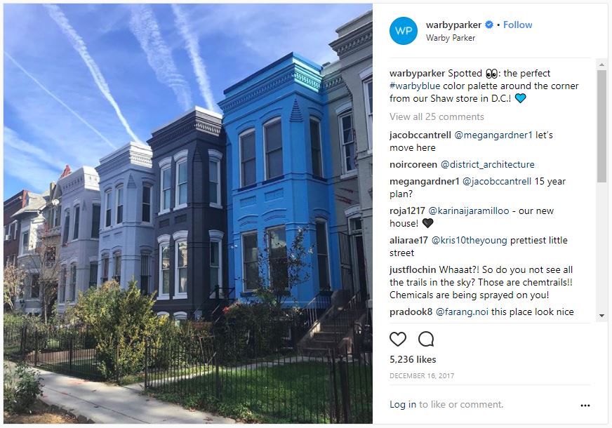 Houses against the blue sky in Warby Parker Blue shade