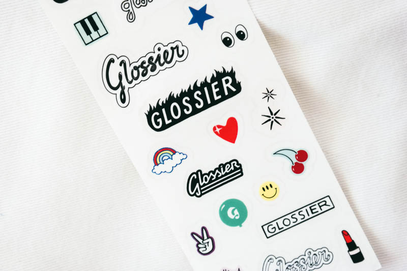 Glossier stickers customers use