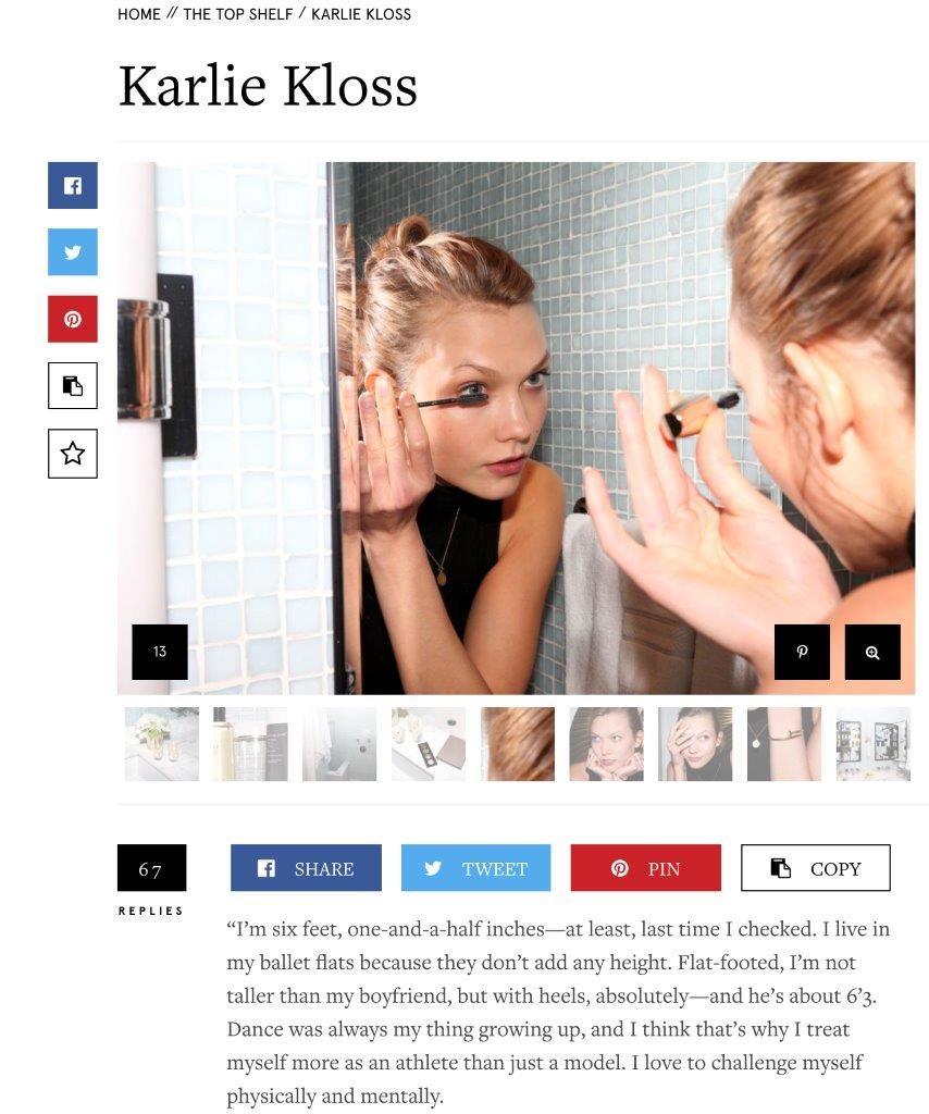 Karlie Kloss looking in the mirror