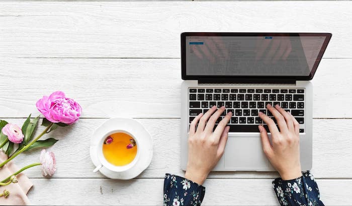 Women Hands Typing on Computer