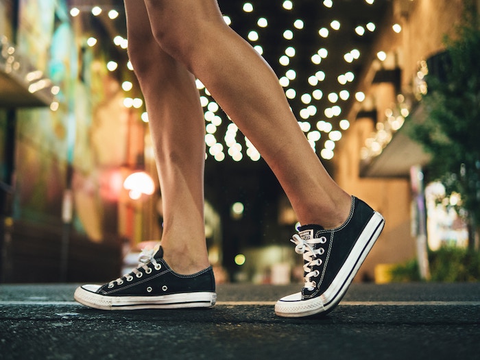 Brand Ambassador Wearing Black Converse Shoes