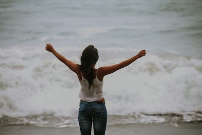 Woman Celebrated at the Beach